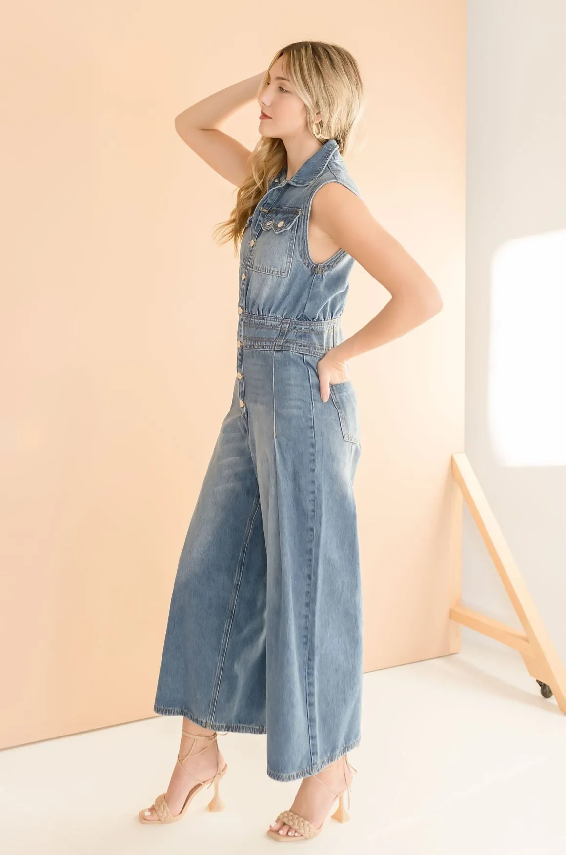 Becca Sleeveless Button Down Denim Jumpsuit Medium Wash