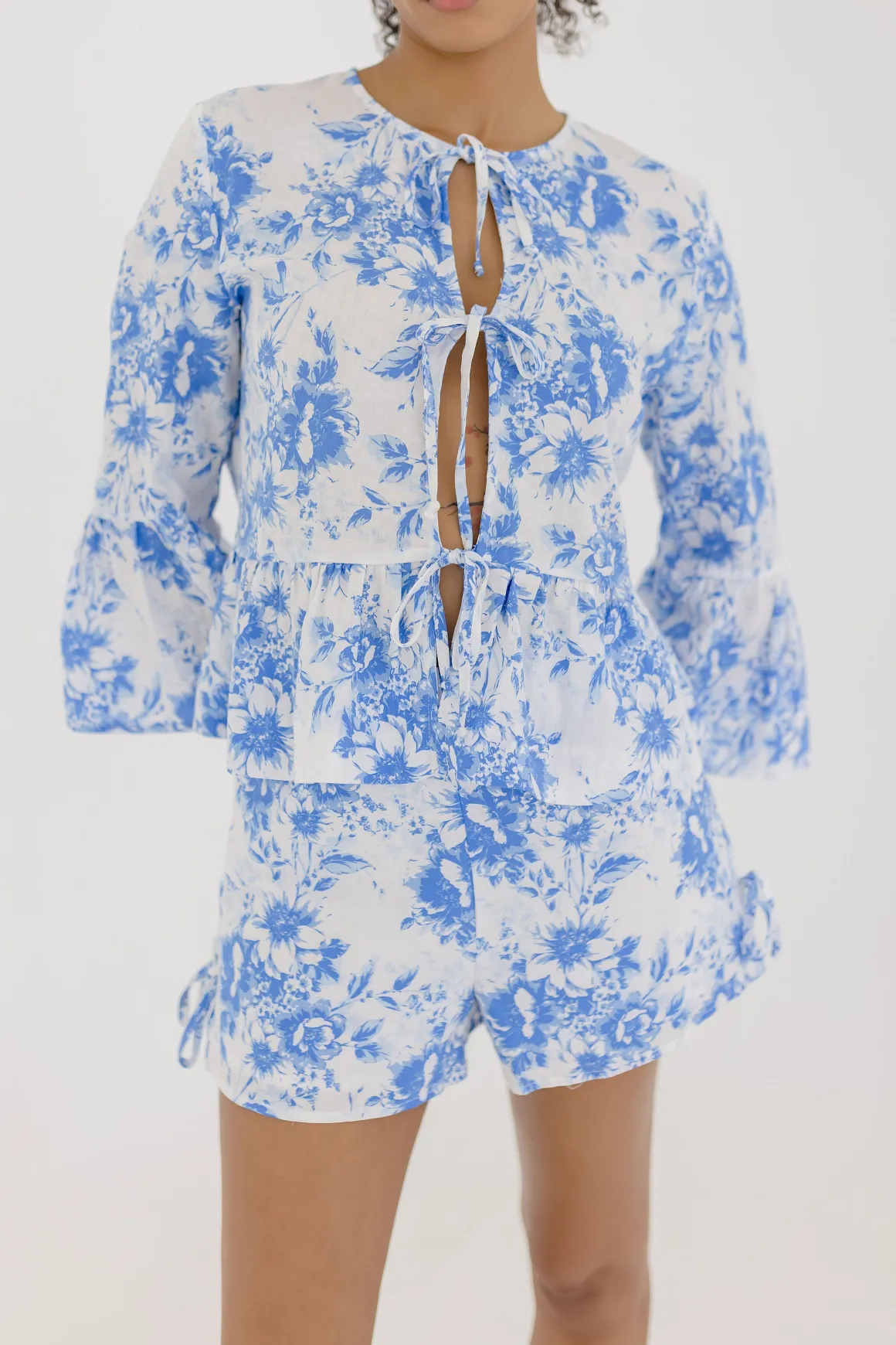 Maribel 3/4 Ruffle Sleeve Front Tie Floral Print Top Blue