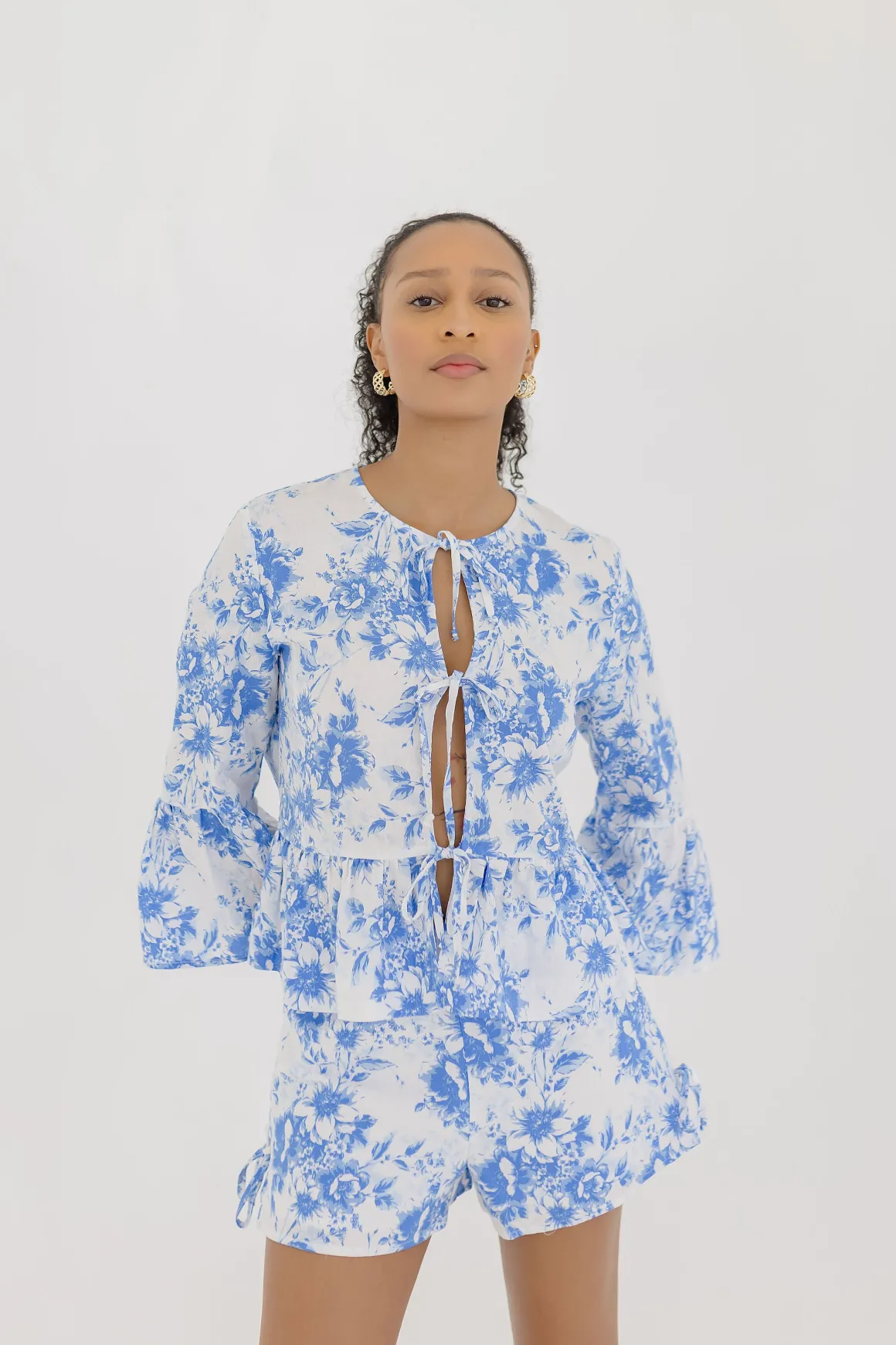 Maribel 3/4 Ruffle Sleeve Front Tie Floral Print Top Blue
