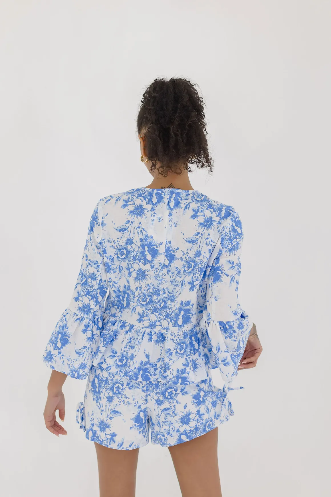 Maribel 3/4 Ruffle Sleeve Front Tie Floral Print Top Blue